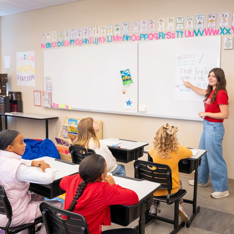 Belmont student teaching children in class