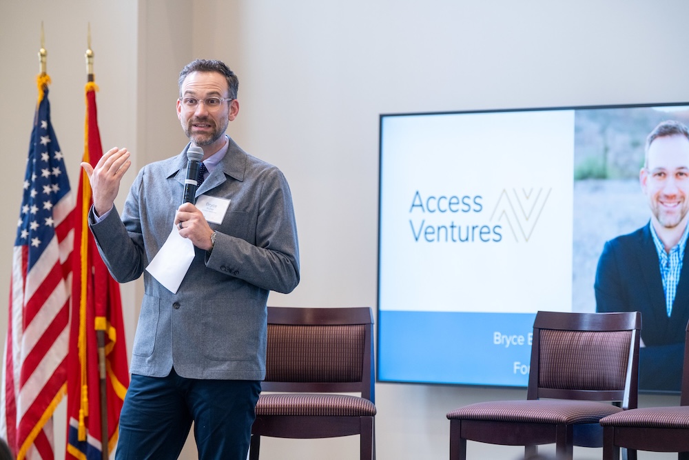 a speaker from Access Ventures talks into the microphone