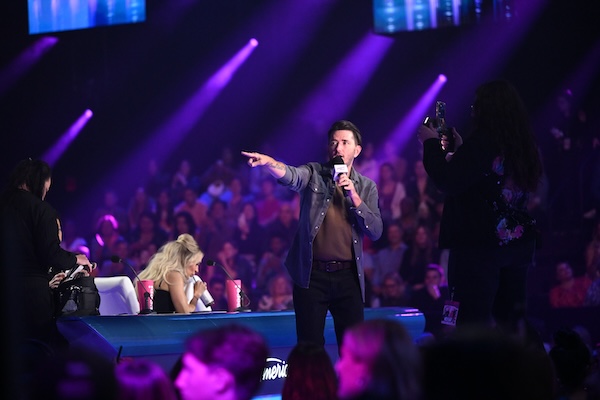 Adam on stage hosting TikTok Live at Idol