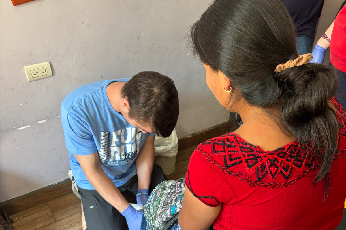 Students treating patients in a clinic 