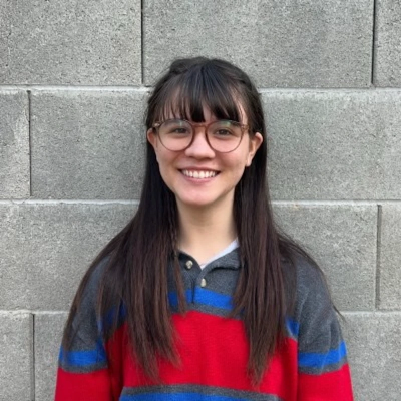 Genevieve Dickerson, smiling at the camera