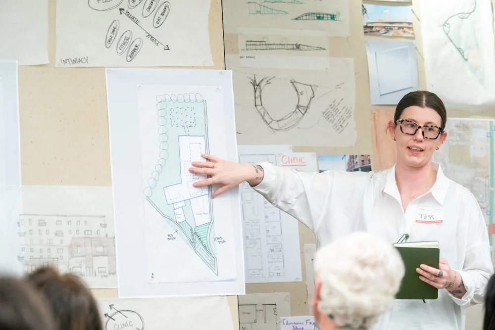 Student presents at a design charette