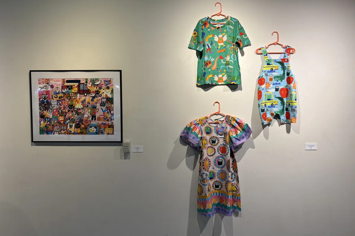 Clothes hanging in a gallery