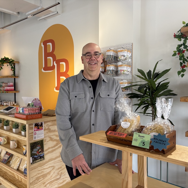 Matt Burhart with products in Bruin Bodega