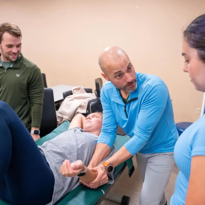Students participating in a physical therapy lab