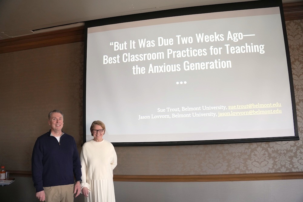 Sue Trout and Jason Lovorn pose with their research