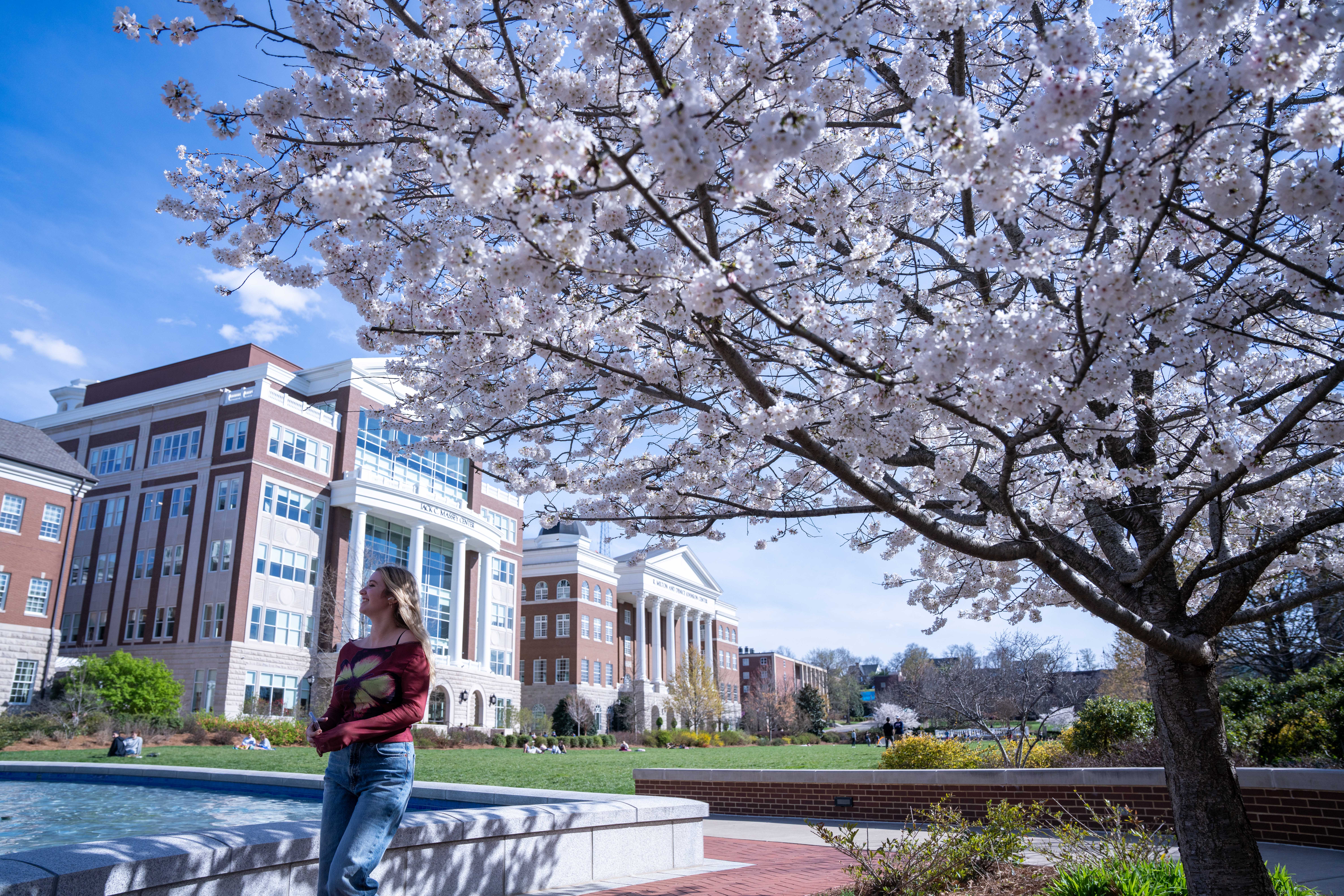 Student on campus in spring