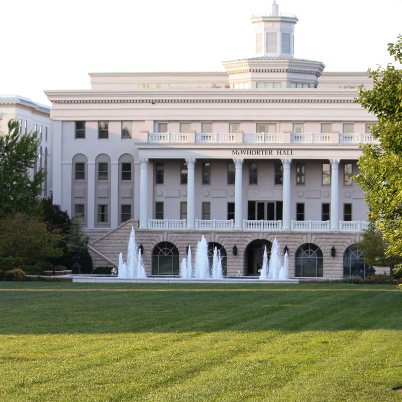 A view of McWhorter Hall and the lawn from an angle
