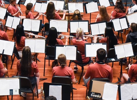 Students in an Concert Hall practicing