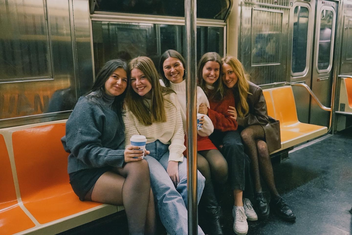 Belmont East students pose for picture on NYC subway