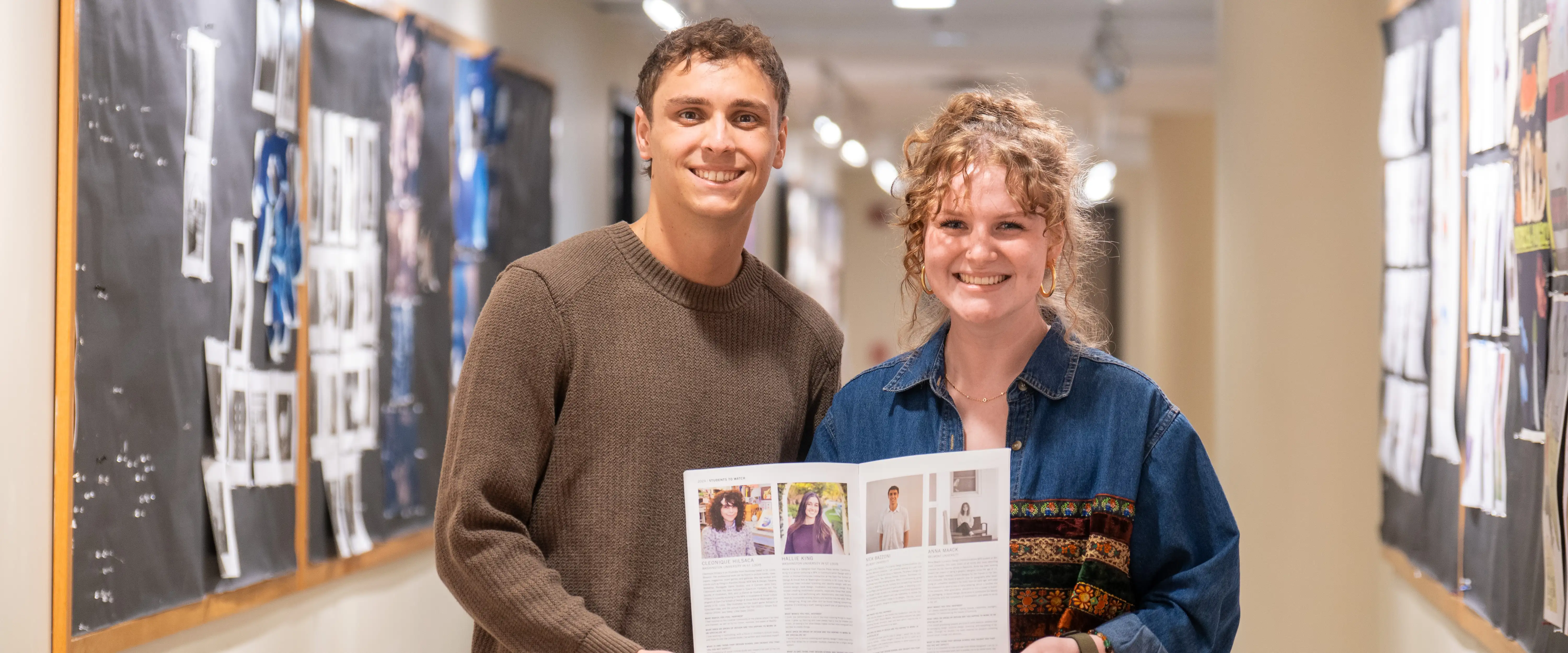 Anna Maack and Nick Bazzoni holding their award winning design