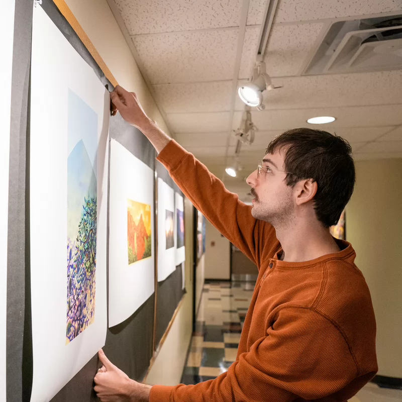 Light blue background with words "only at Belmont'